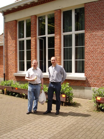 Marcel van Herck (on the left) and Eddy van Beers between rounds at the Belgian Solving Championship in 2005.